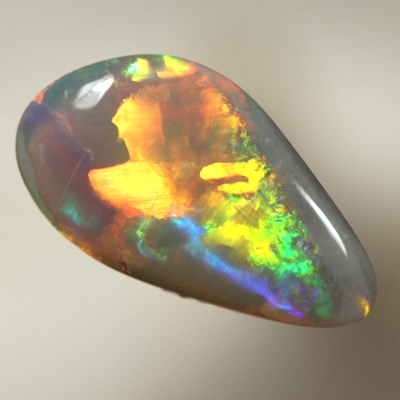 SOLID SEMI BLACK OPAL Large rolling flashes of bright multicolours